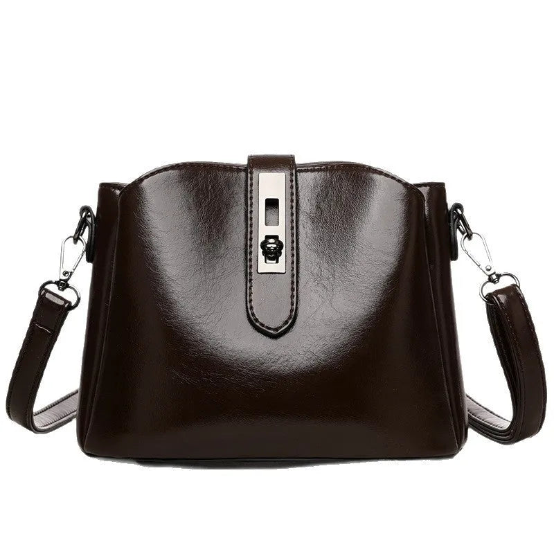 Retro women's messenger bag in PU material with medium hardness and sandwich pocket, available in white black brown