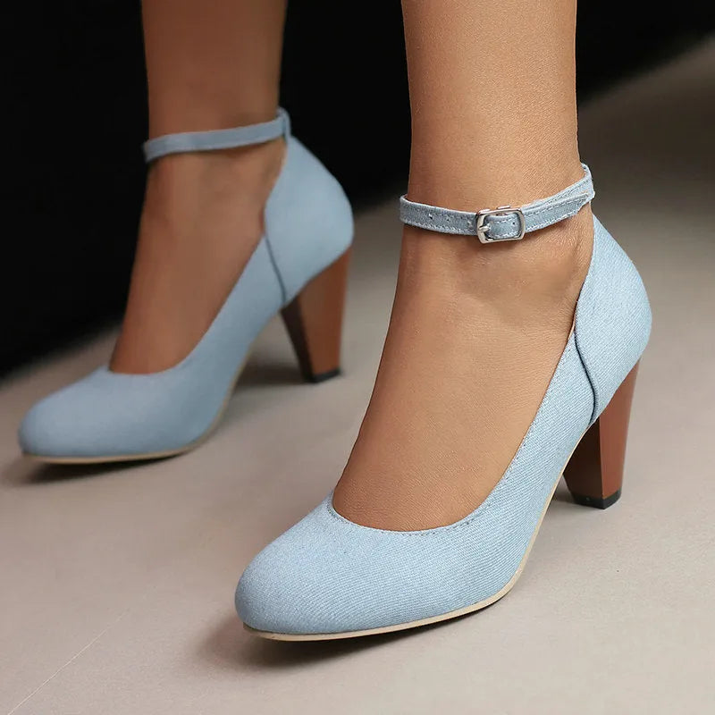 Women's blue denim platform high heels with an ankle buckle and waterproof sole.