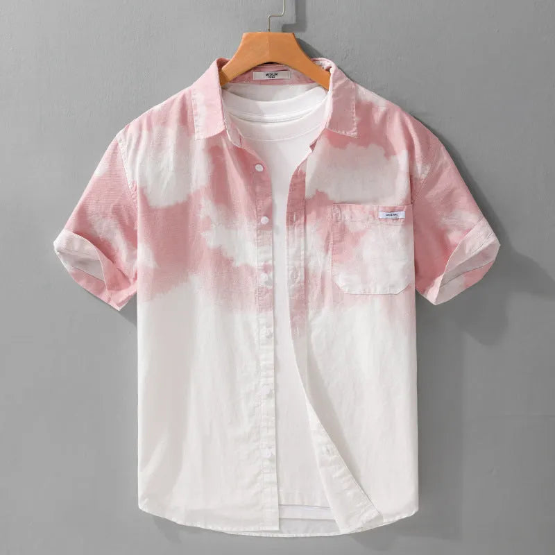 Man modelling a light pink loose-fitting pure cotton short-sleeved cardigan shirt.