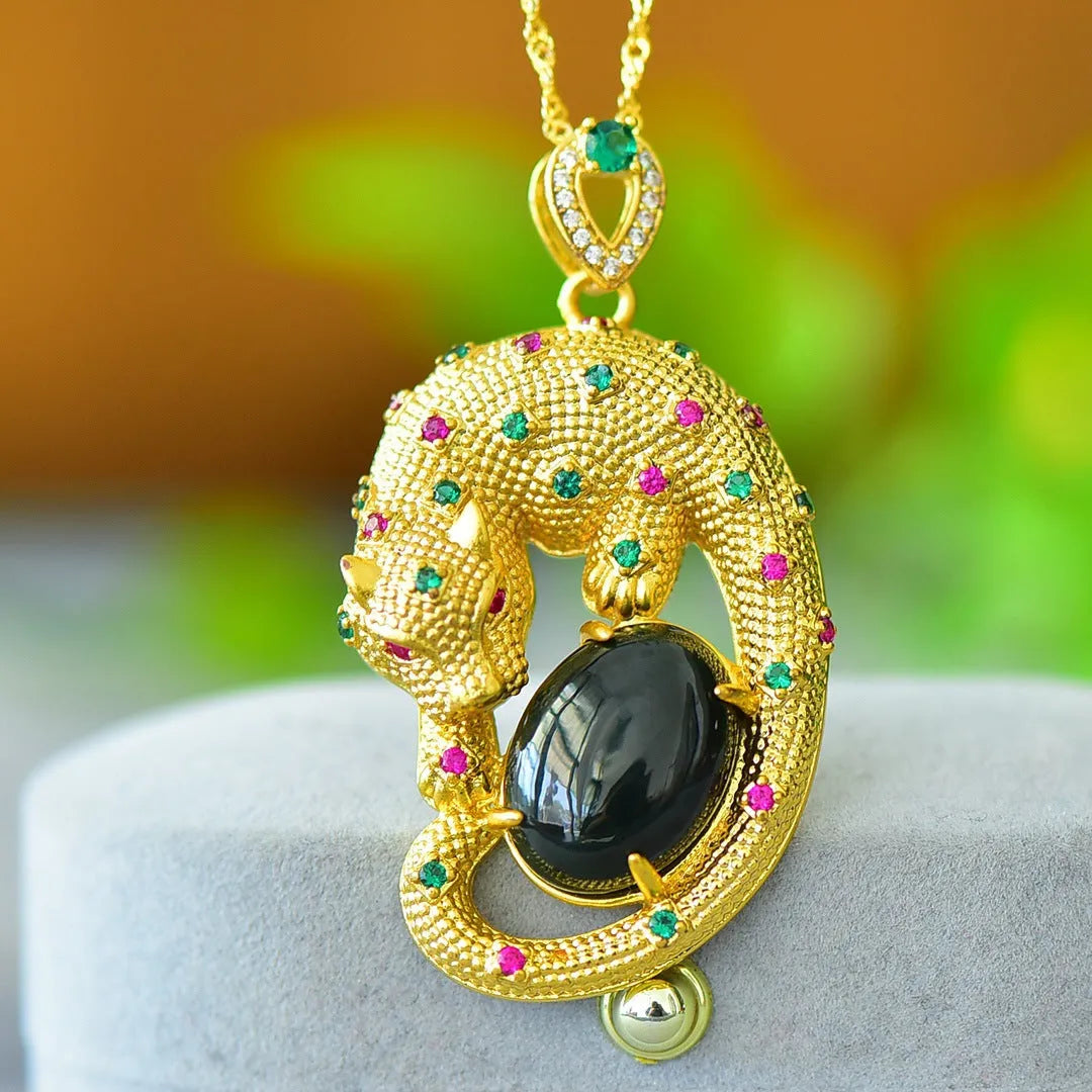 Copper inlaid natural Hetian gray and ink blue jade pendant necklace on a chain.