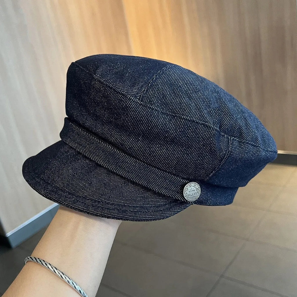 Dark blue denim octagonal newsboy hat with adjustable 54-58cm sizing and colour accent brim options
