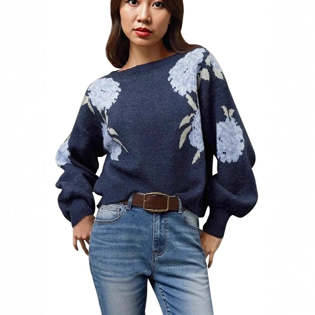 Sapphire blue women's loose pullover with a raised floral jacquard pattern and long sleeves.