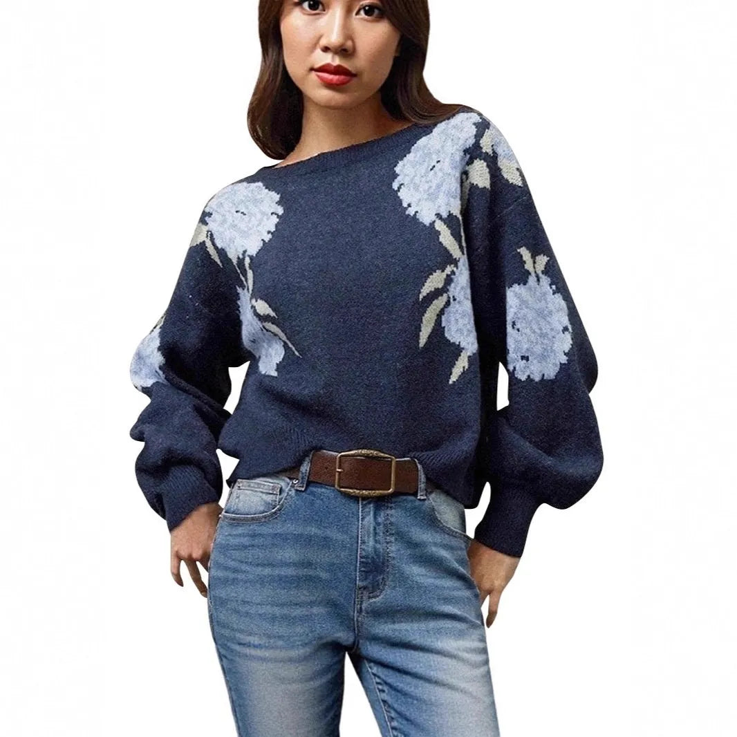 Sapphire blue women's loose pullover with a raised floral jacquard pattern and long sleeves.