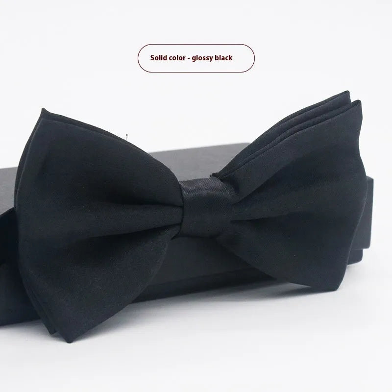 Solid colour polyester bow tie with flat head design measuring 12cm by 6cm