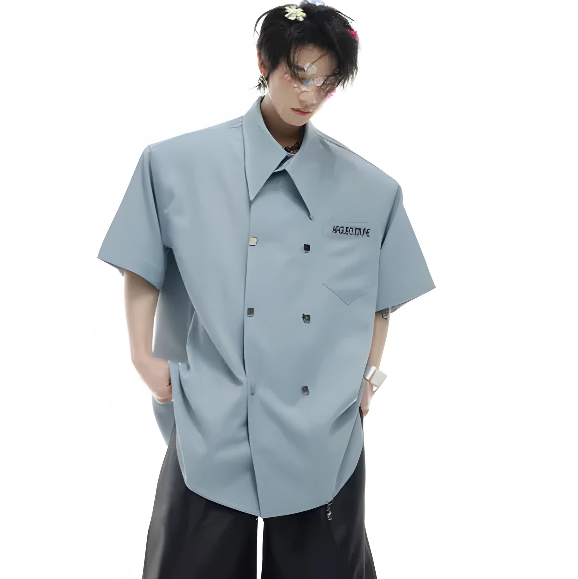 A man's loose-fit casual short-sleeved shirt in a blue colour with a lapel collar and decorative splicing details.