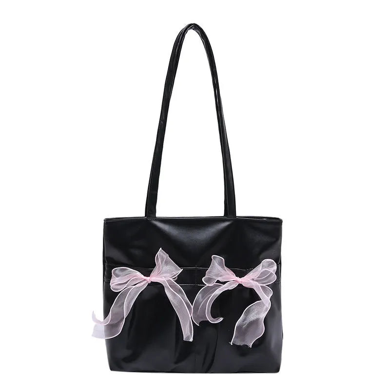 College style bow tote bag in black or pink with large capacity and internal zipper compartment