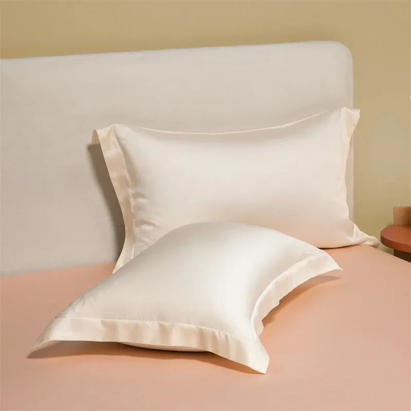 Luxury Lenzing Tencel quilt cover and pillowcase set in a modern style, showing colour options like Aurora Blue.