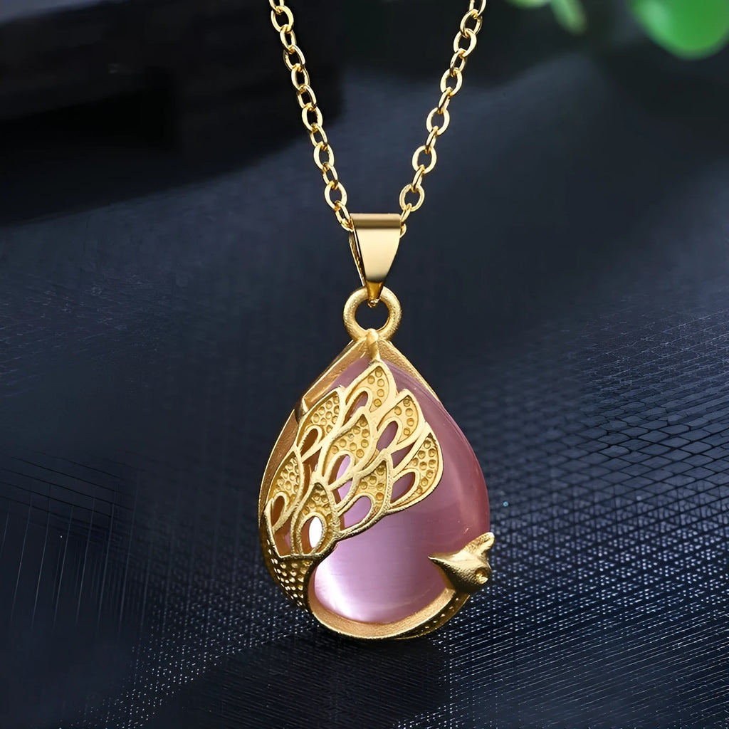 Green chalcedony imitation crystal peacock pendant on copper electroplated base with fu character element