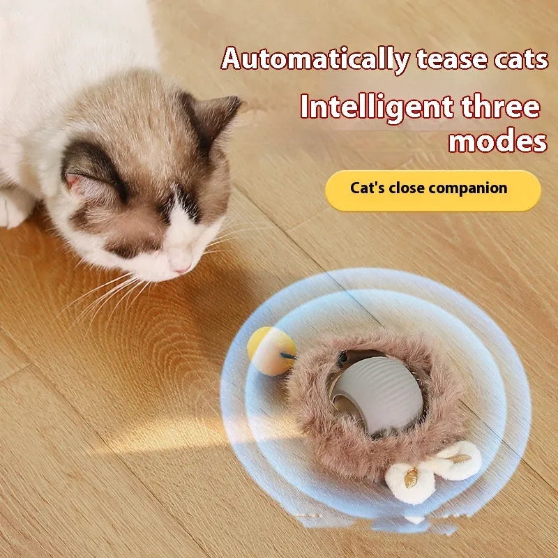Silicone self-moving rolling ball cat toy in green, red, and grey colour options.