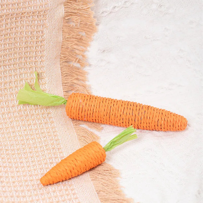 Assorted cat toys bundle showing carrot bites, ringing stones, sticks, and dental aids in two size options
