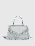 Retro tassel bag mini crossbody bag in denim blue colour, PU material, with tassel detail and crossbody strap.