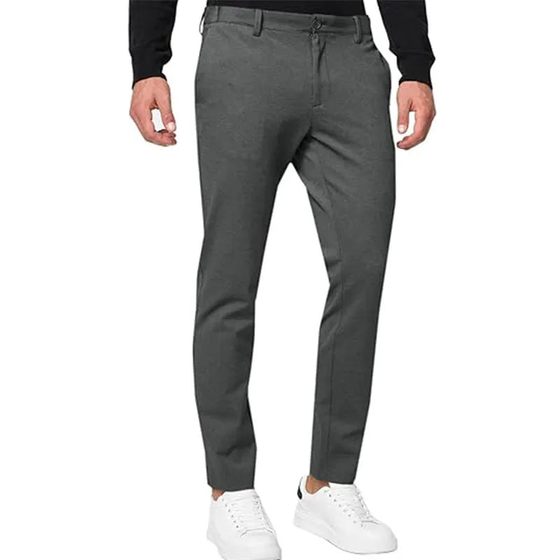 Men's slim-fit stretch chino trousers in khaki colour, showing tapered leg and zip fly detail.