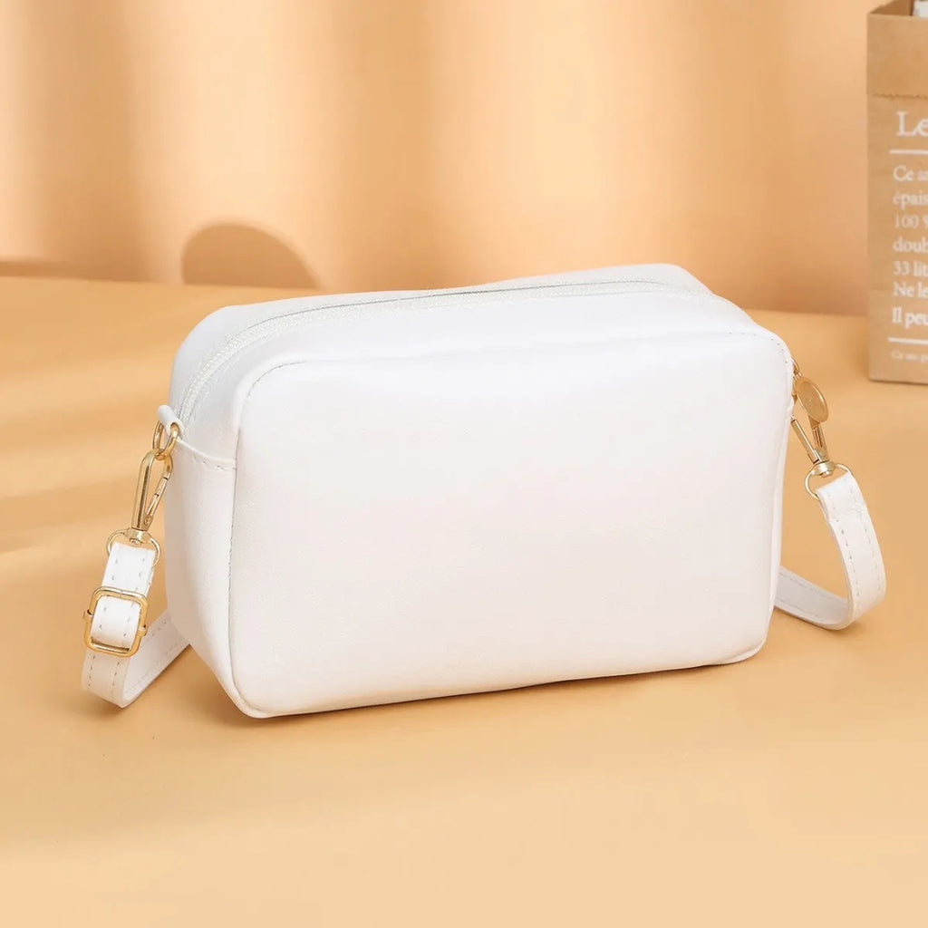Solid colour women's PU shoulder bag with three-dimensional pocket design in urban simple style