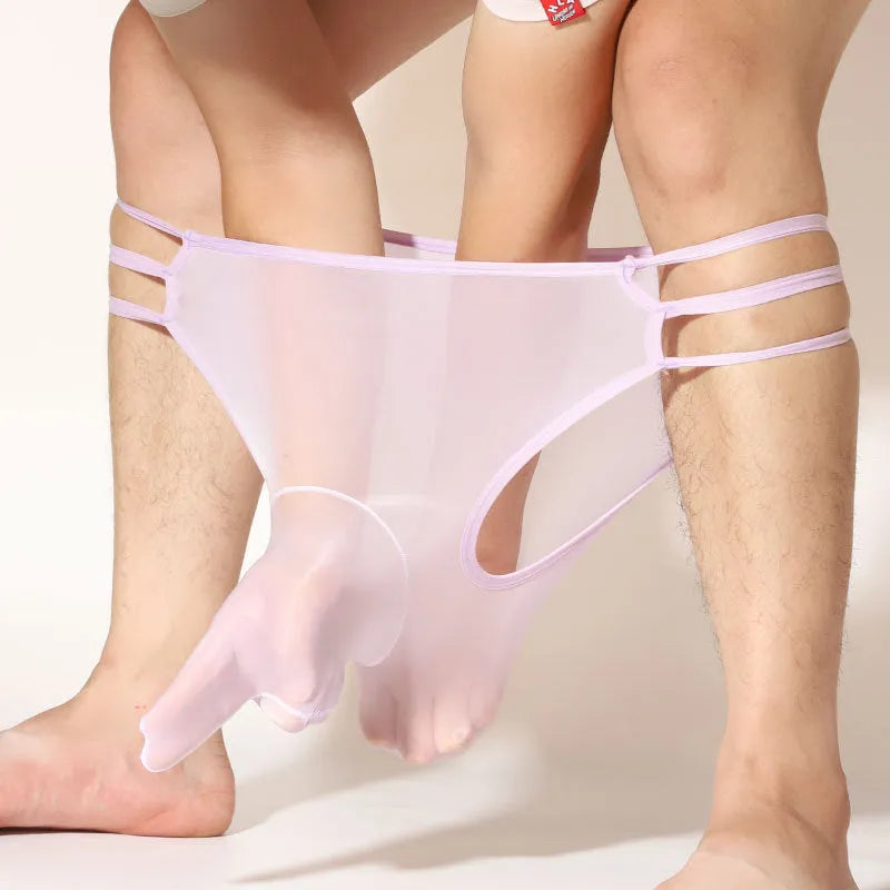 Men's transparent elephant nose shorts in stretch nylon fabric on a mid-waist model.