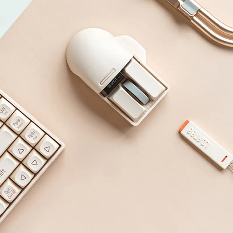 Xiaoqiao Tofu-coloured three-mode wireless mouse with USB-C cable on a desk