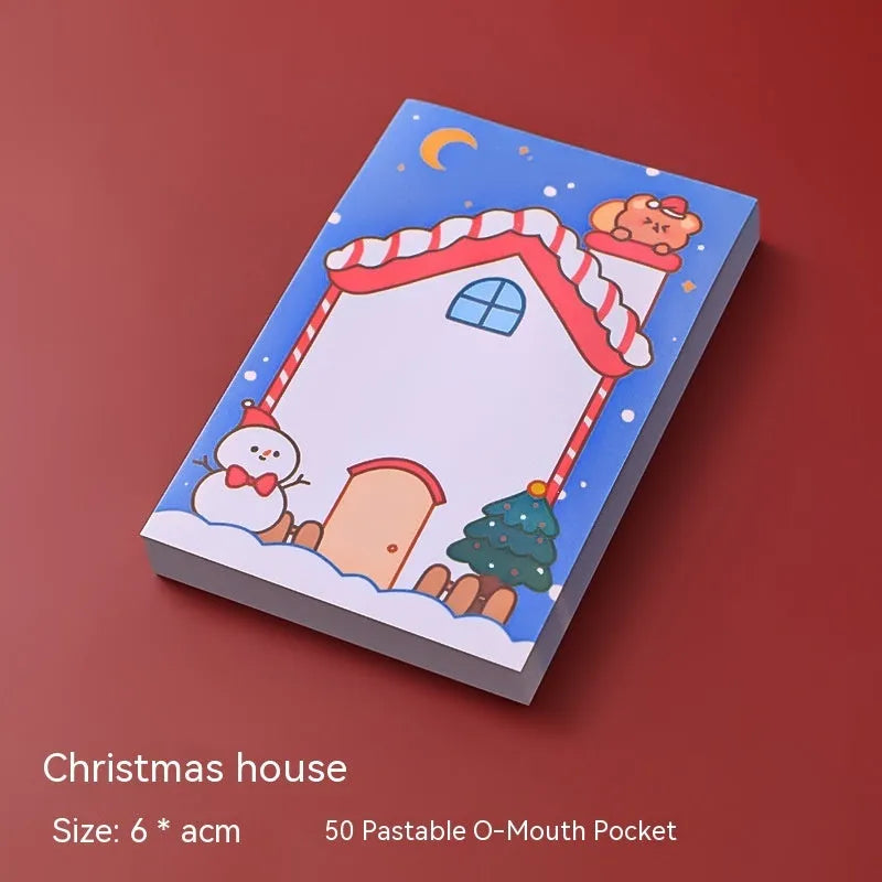 Christmas sticky notes pad with festive designs including elf, gift, sled, Santa Claus, bear, and snowman
