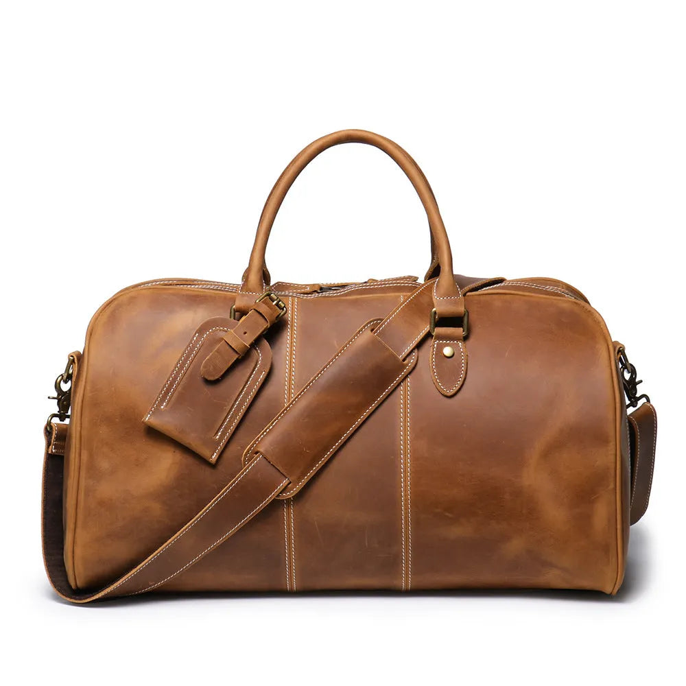 Retro genuine leather travel bag in vintage brown with sewing line detailing and shoulder strap