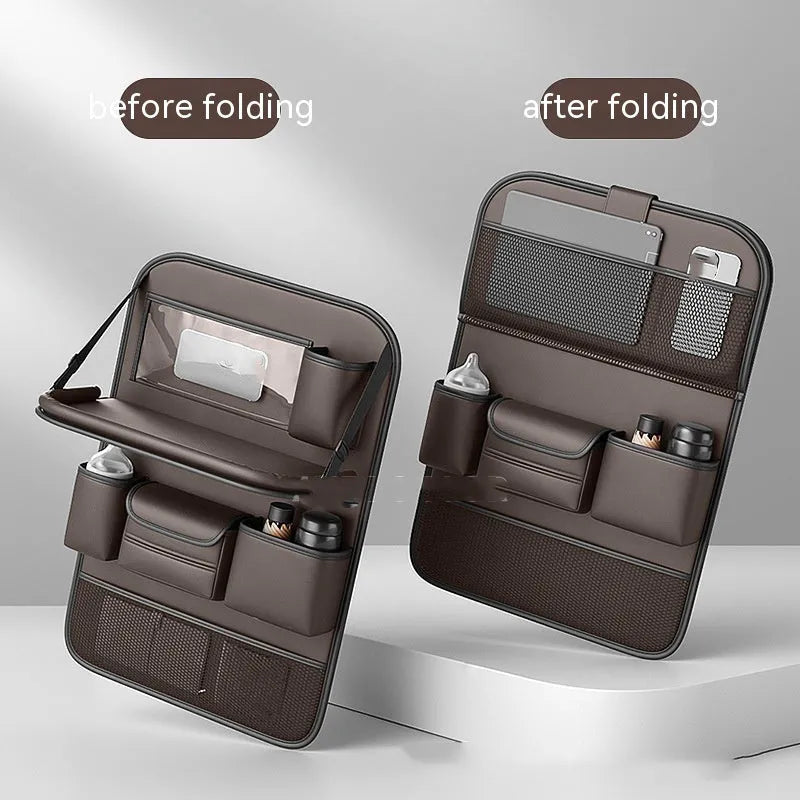 Car seat lazyback storage bag in Obsidian Black with foldable dining table extended, hanging on a car front seat backrest