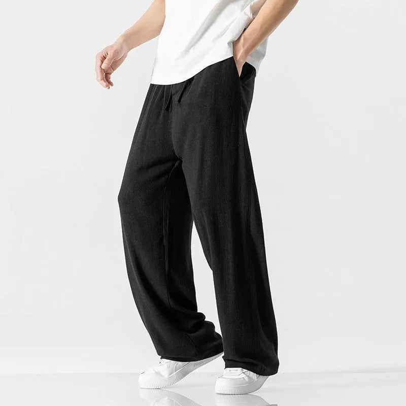 Men's bamboo fibre linen trousers in loose straight-leg cut with cropped length and drawstring waist
