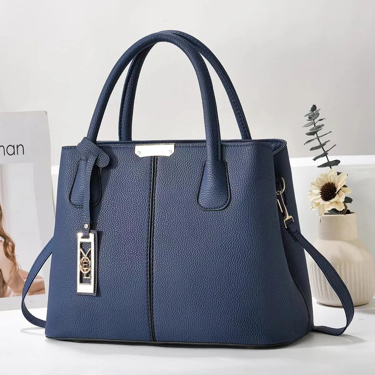 Soft PU fashion handbag with leather shoulder strap in horizontal square shape