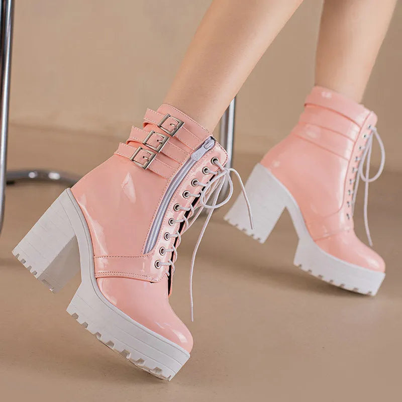 Women's black thick heel ankle boots with lace-up front and round toe on waterproof platform sole