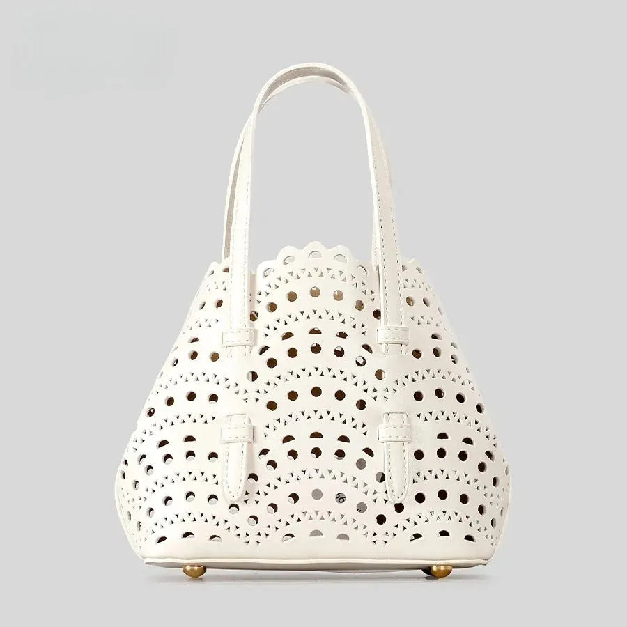 Hollow carved PU messenger bag with three shoulder straps in horizontal square shape