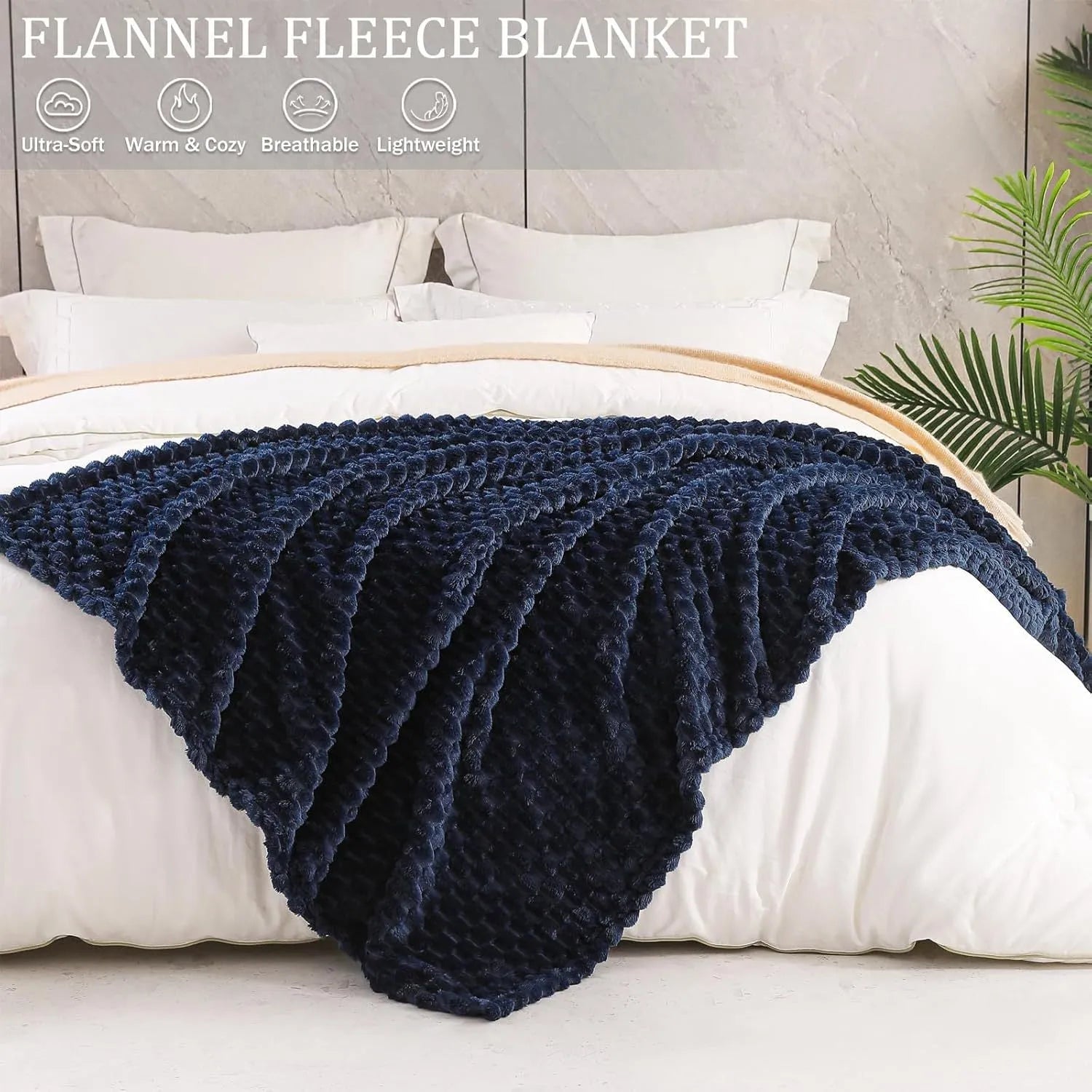 Soft camel-coloured plaid fleece blanket for children folded on a bed.