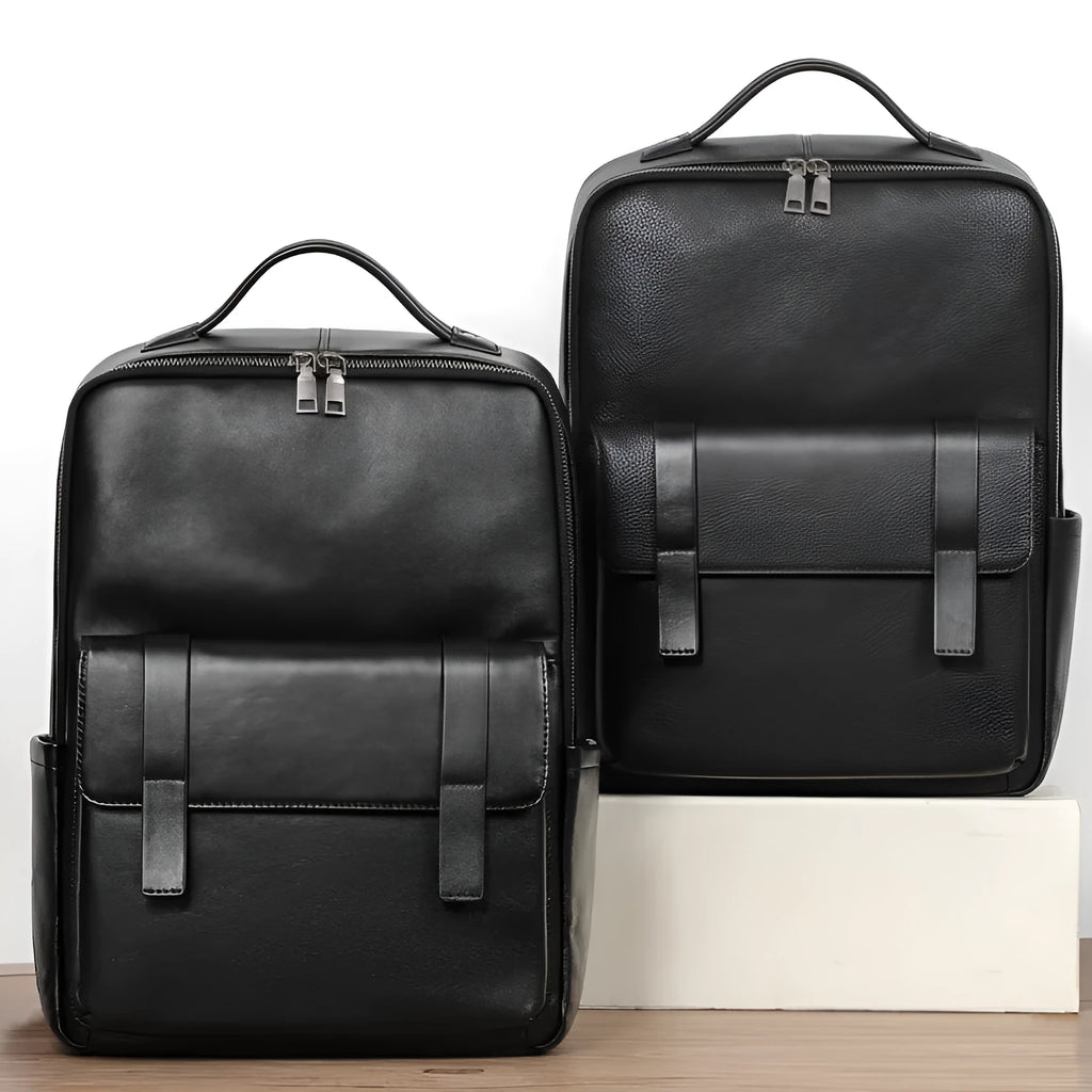 Black genuine leather men's computer backpack with a large main compartment.