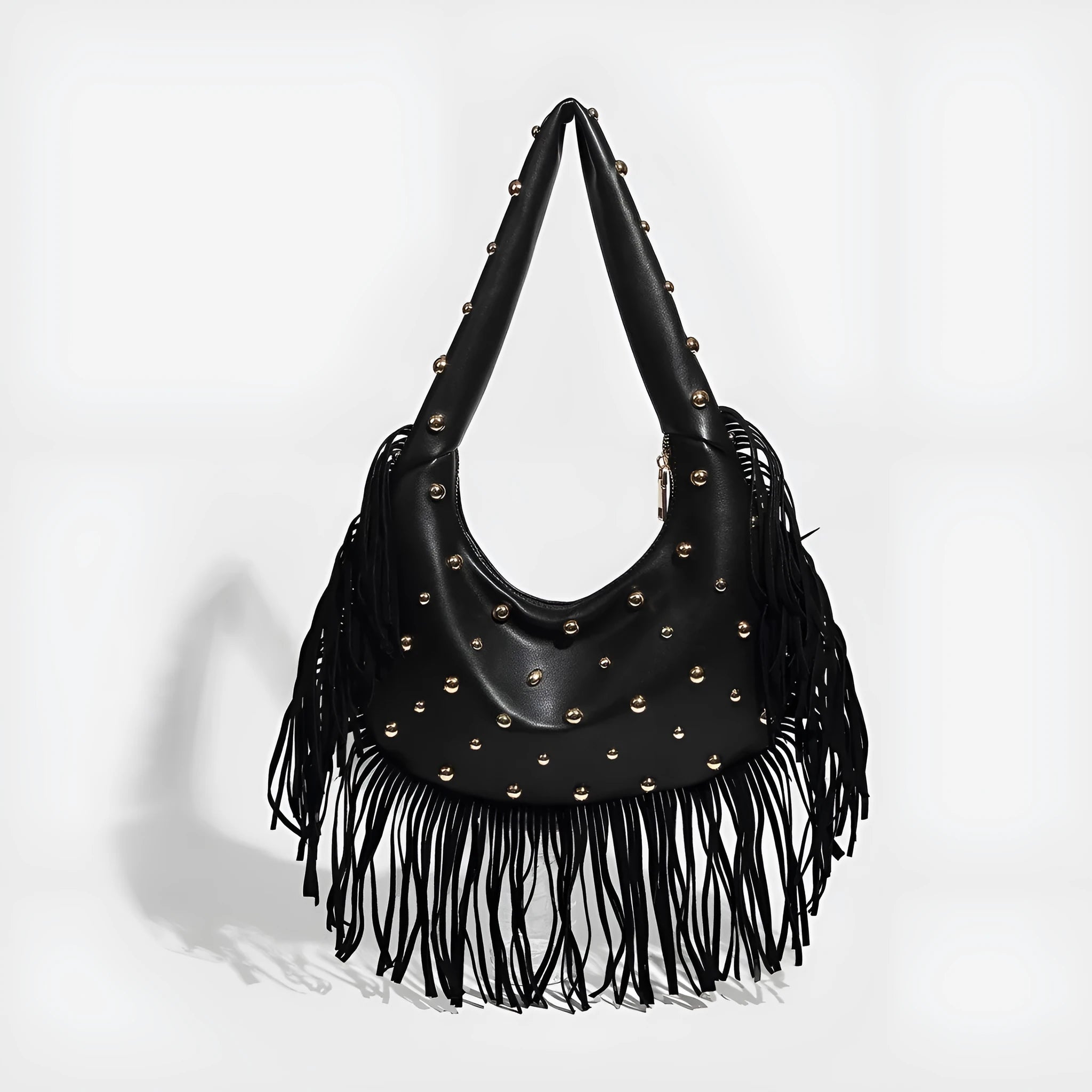 Retro black shoulder handbag with a tassel detail and an internal mobile phone pocket.