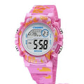 Children's electronic watch with 30mm round dial and silicone strap in blue colour on a child's wrist
