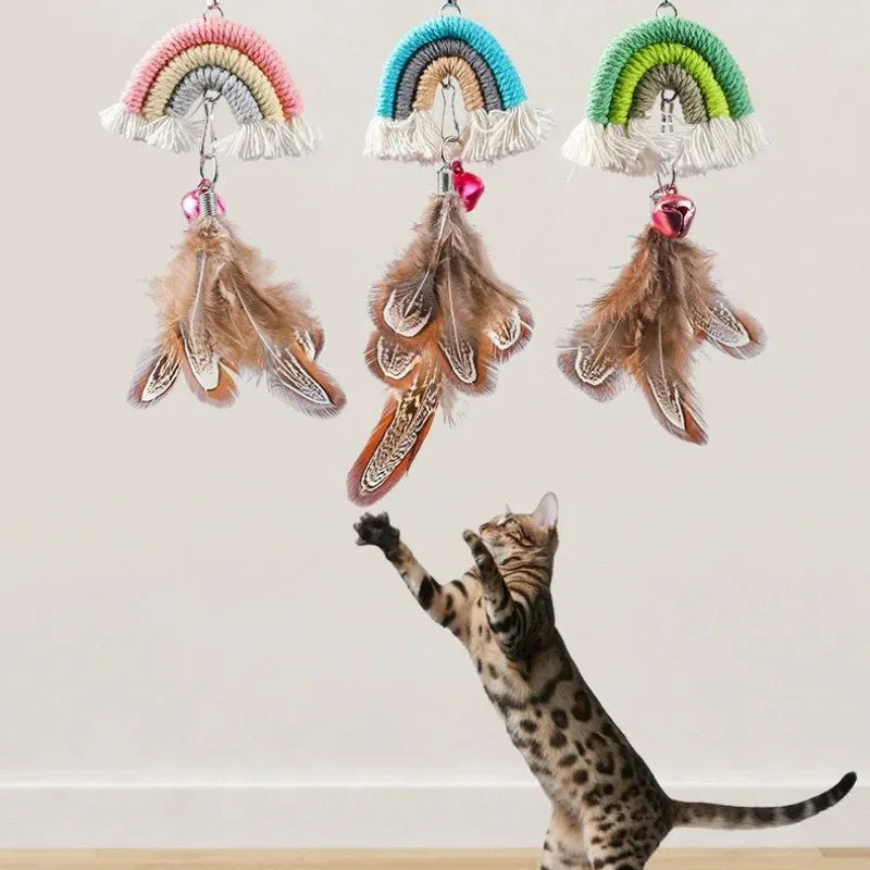 Cat door swing toy with colourful feathers on elastic cord attached by sticky buckle clamp