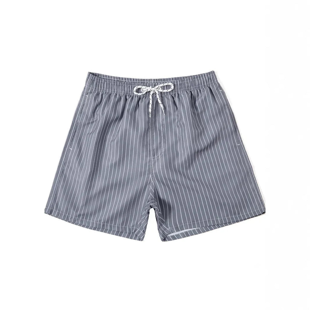 Men's striped beach shorts in navy blue, made from polyester fibre with a straight leg opening.