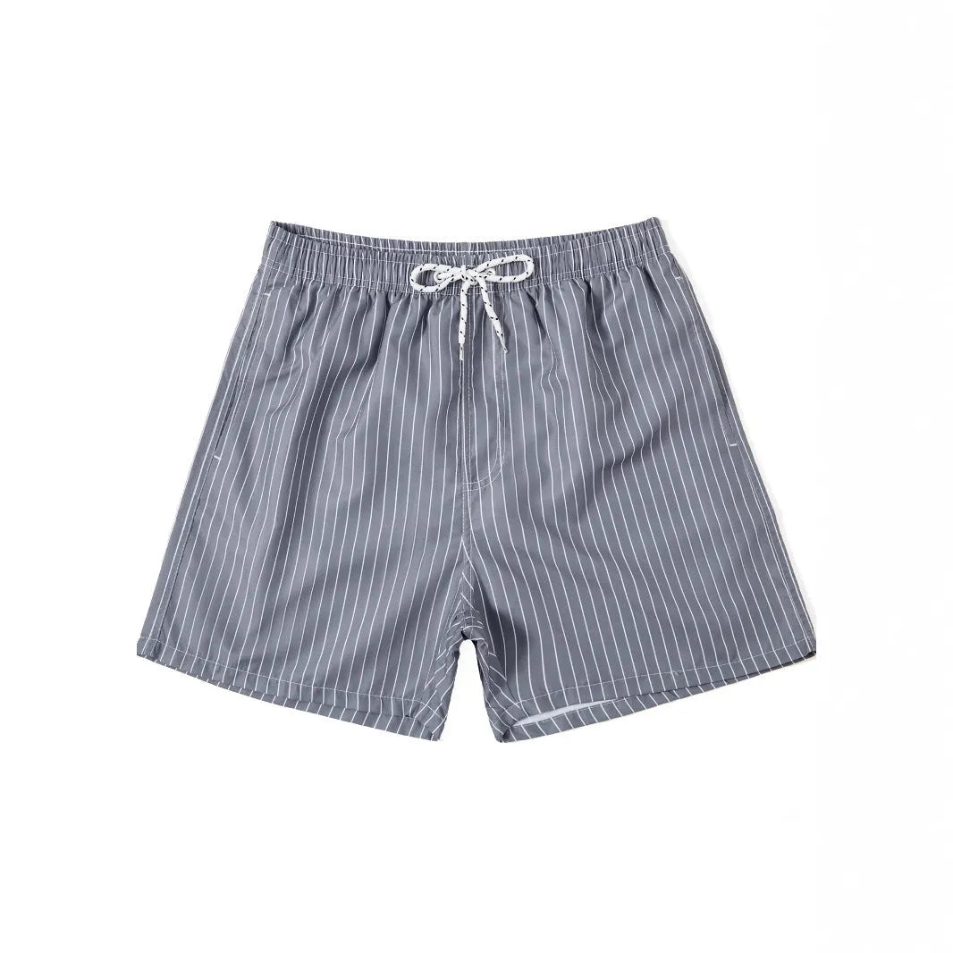Men's striped beach shorts in navy blue, made from polyester fibre with a straight leg opening.