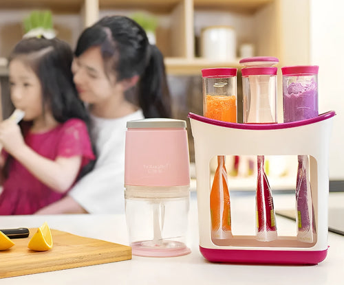Baby food Squeeze Station machine with 4oz pouches and spoons on a table