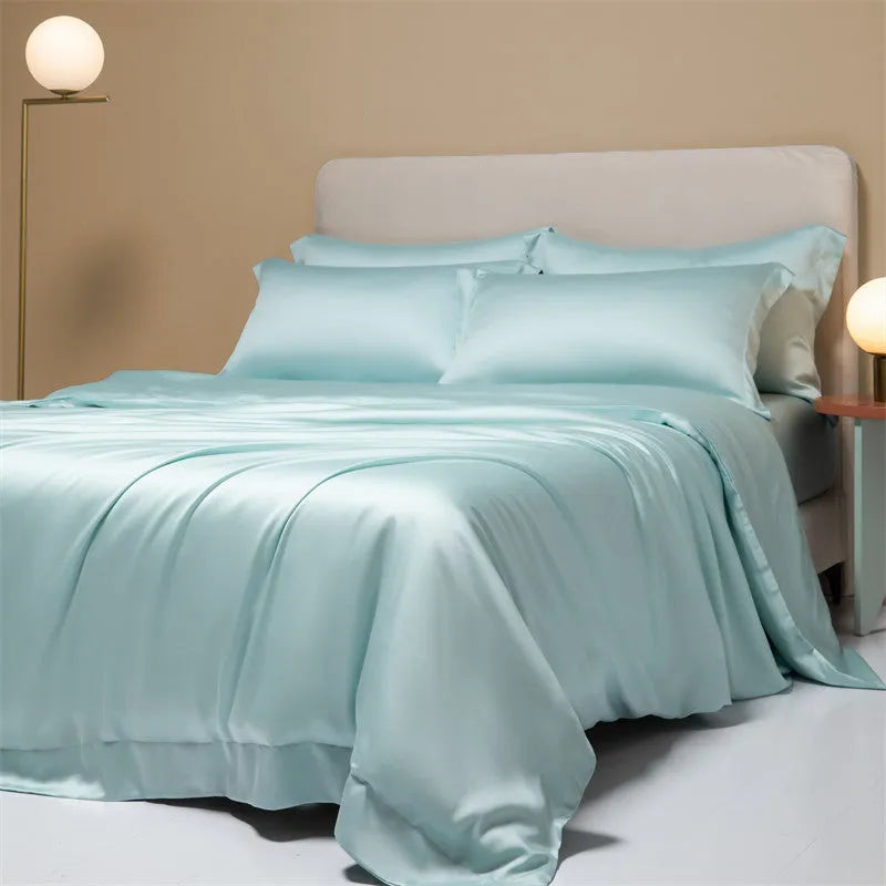Luxury Lenzing Tencel quilt cover and pillowcase set in a modern style, showing colour options like Aurora Blue.