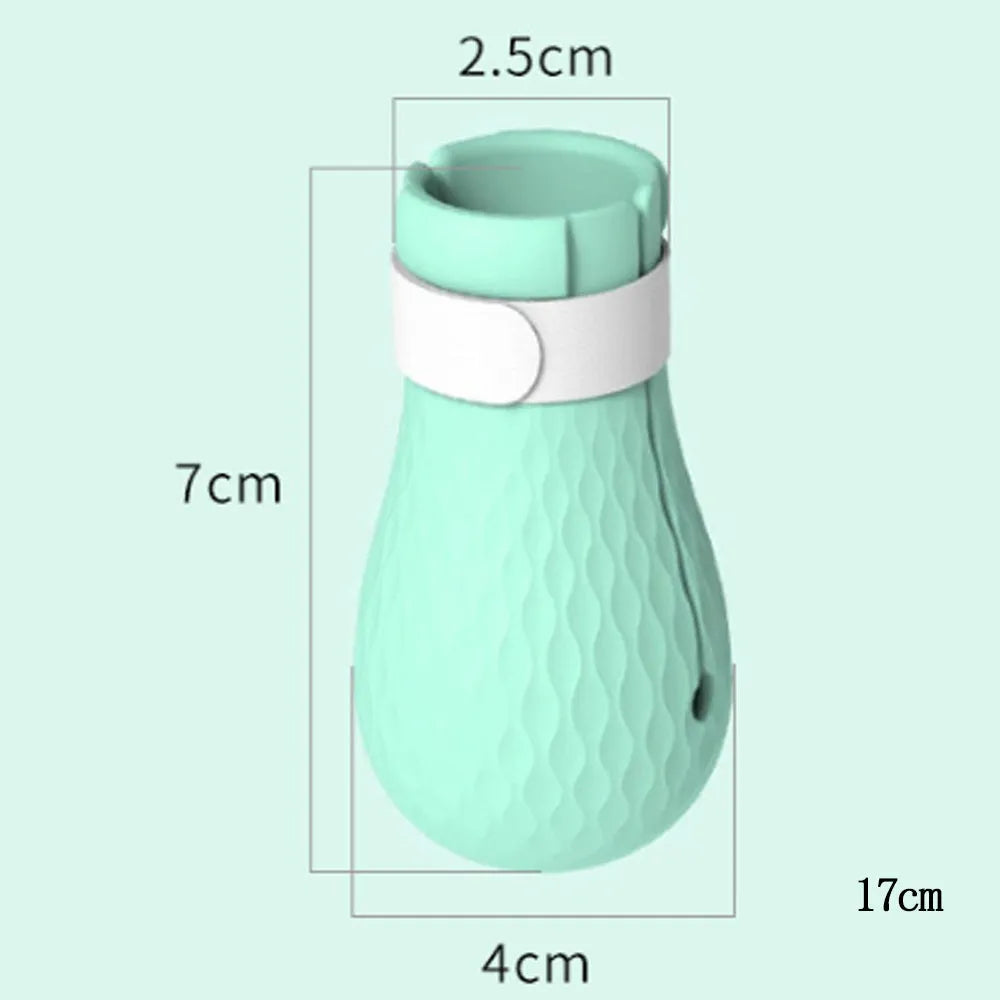Four green silicone cat anti-scratch foot covers for paw protection during washing and handling
