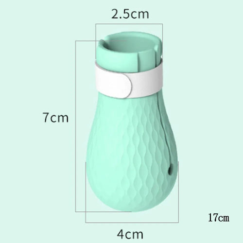 Four green silicone cat anti-scratch foot covers for paw protection during washing and handling