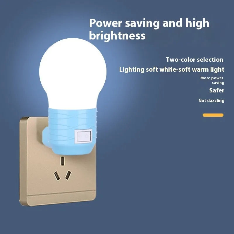Compact round plug-in bedside lamp in white, blue, or pink for night feeding.
