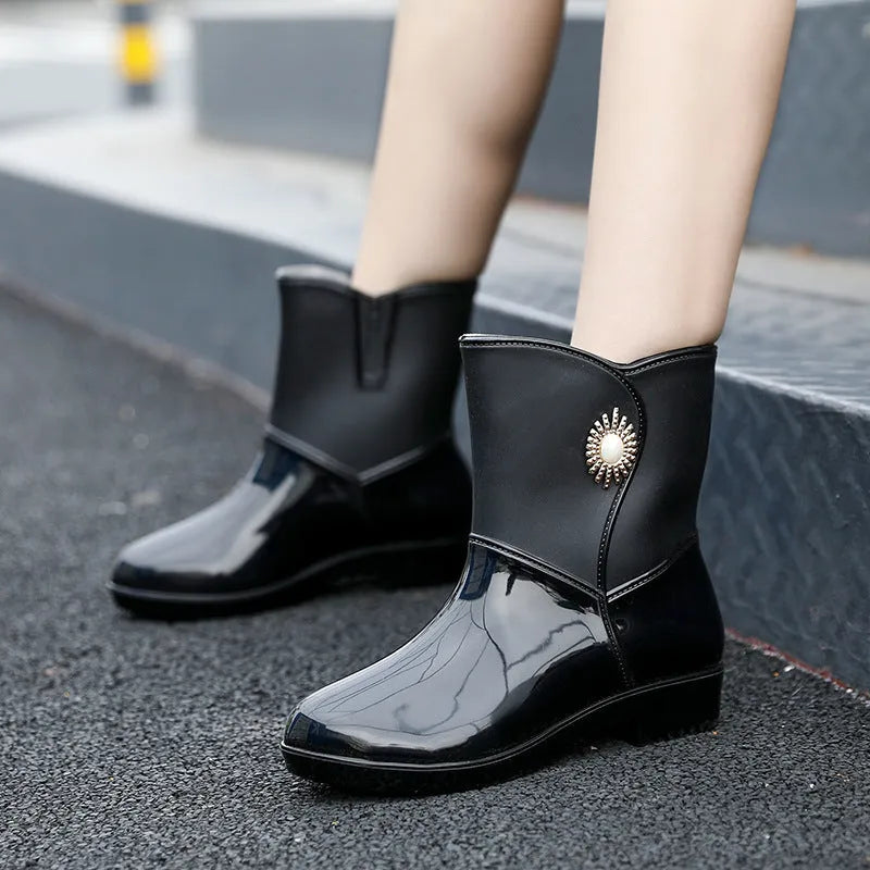 Women's mid-calf rain boot in beige with a non-slip sole and thickened lining.