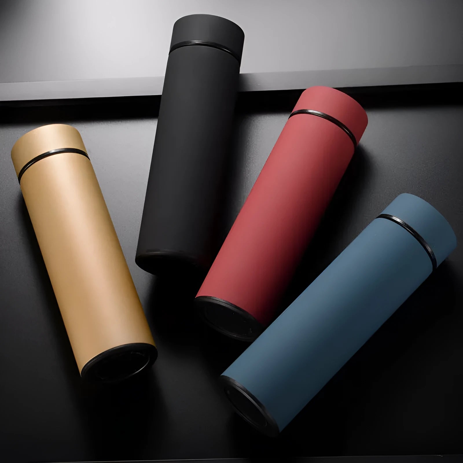 450ml stainless steel vacuum insulated water bottle in black, red, gold, or blue colour