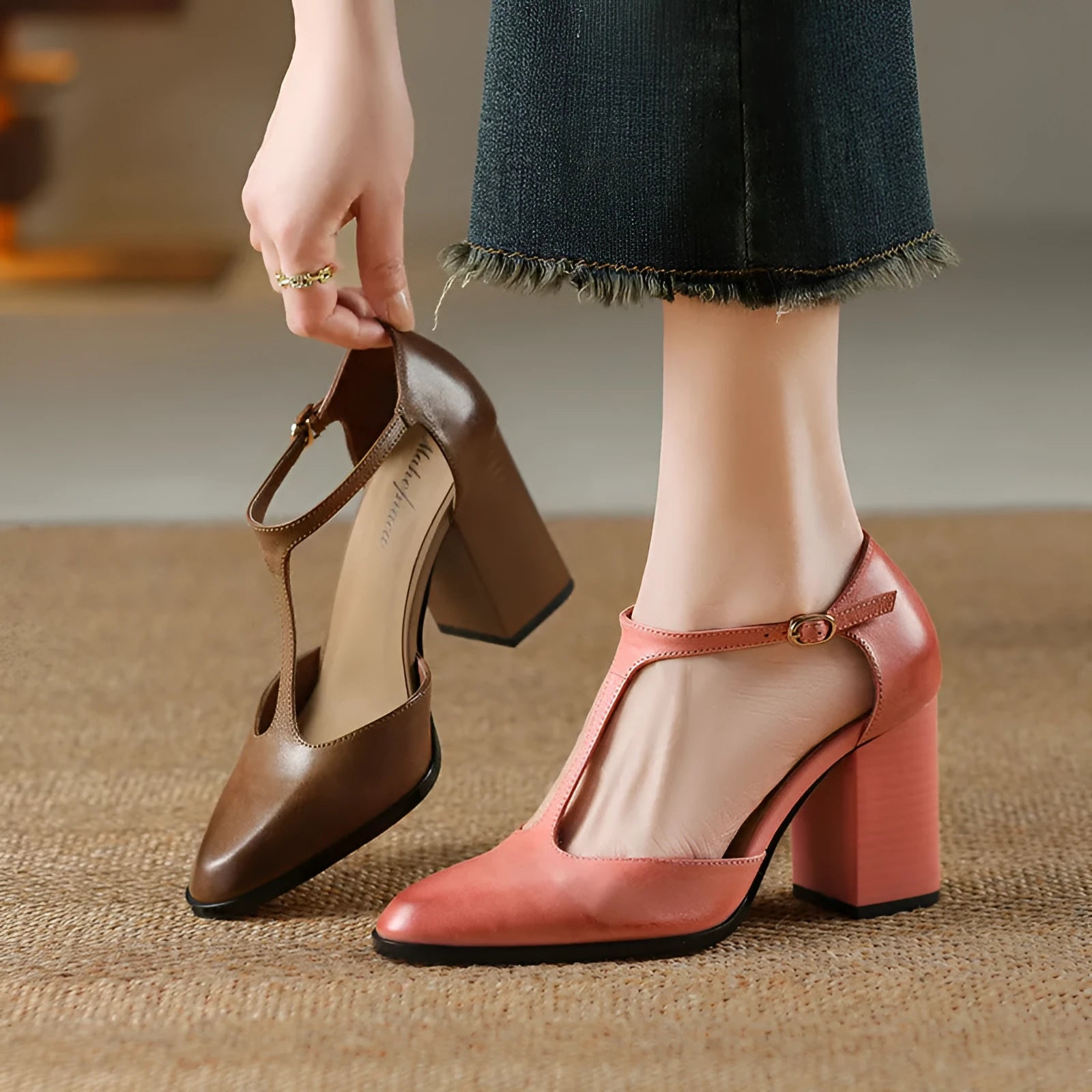 Women's pink retro Mary Jane shoes with a pointed toe, buckle strap, and cowhide leather upper.