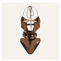 Gold coloured handmade one-piece swimsuit with a halter neckline and hollow-out design.