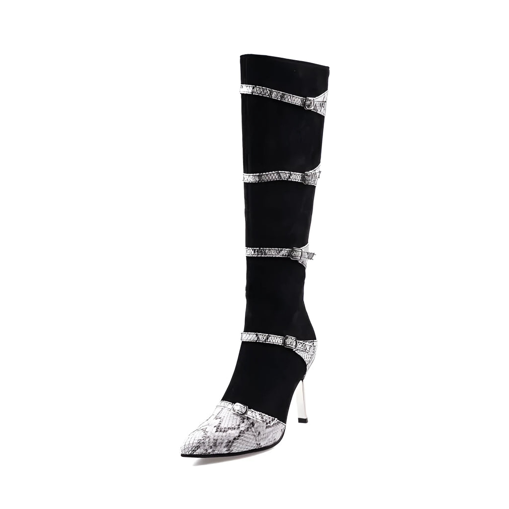 Grey women's knee high boots with a thin high heel and pointed toe on a plain background.