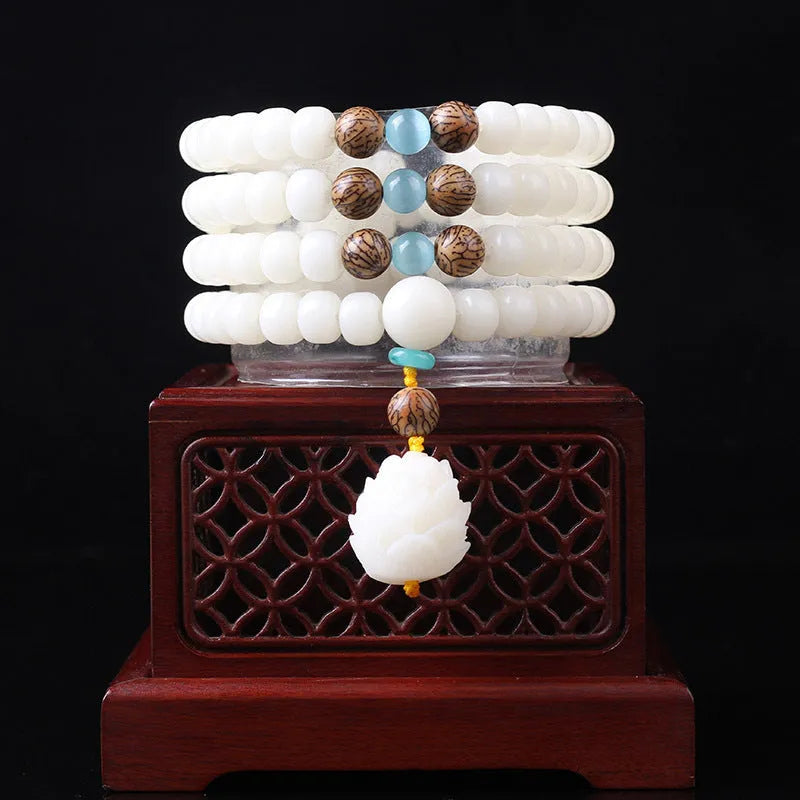 White jade Bodhi beads long bracelet with 6x8mm beads, showing various style options.