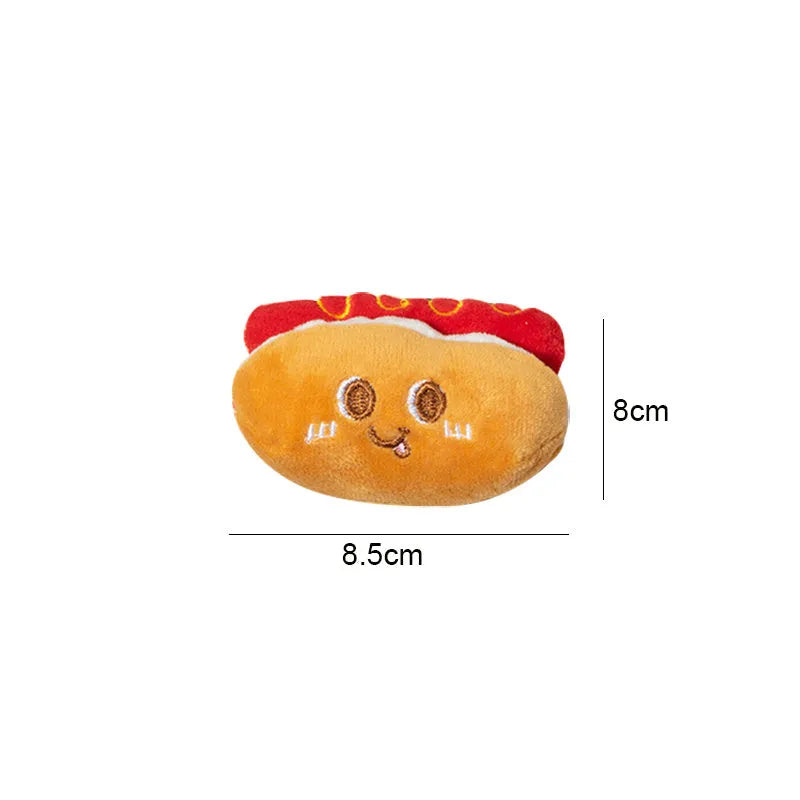 Assorted soft kitten teething toys shaped like a hamburger, chicken leg, fries, bread, and hot dog.