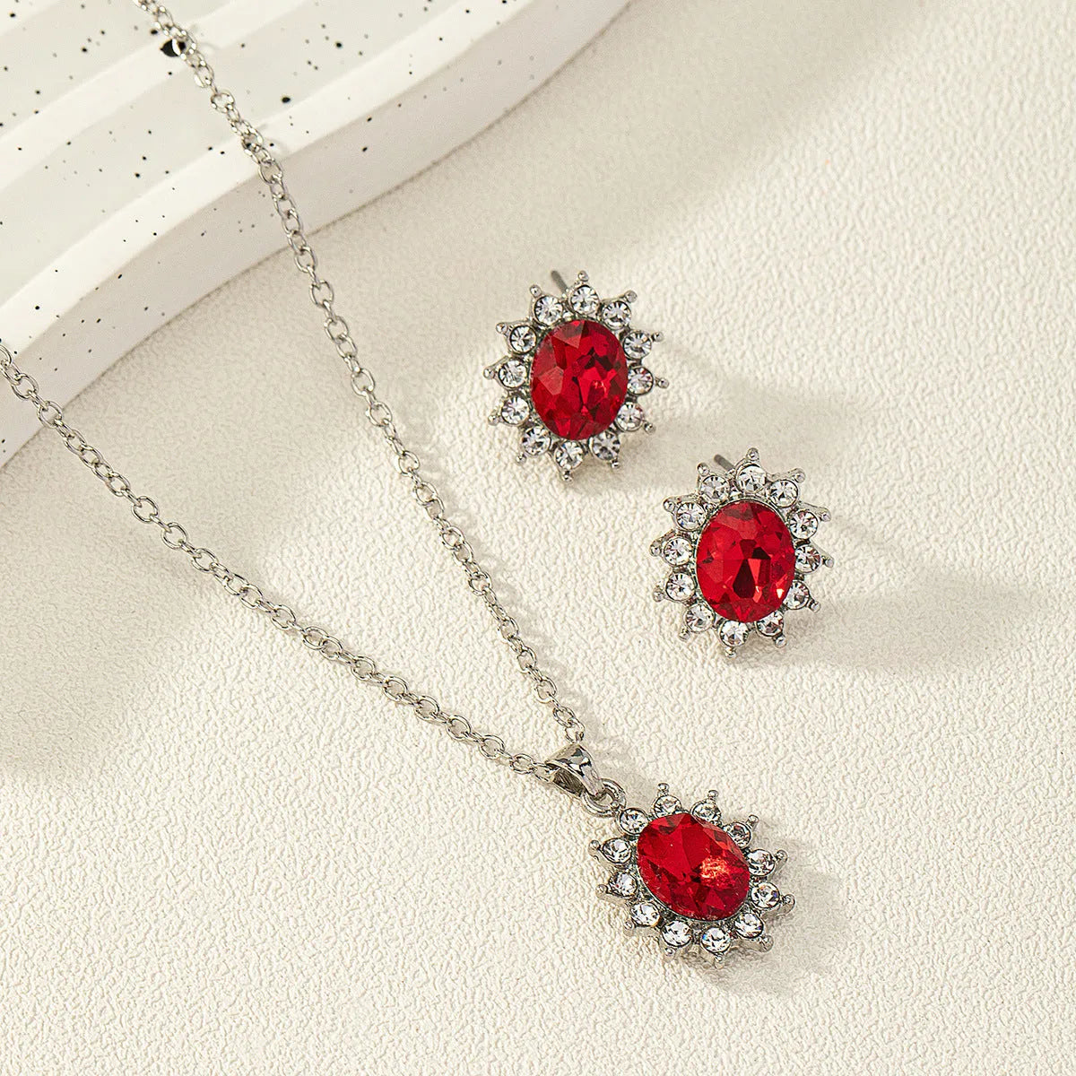 Women's alloy sunflower zircon earring and necklace set in six colour options.