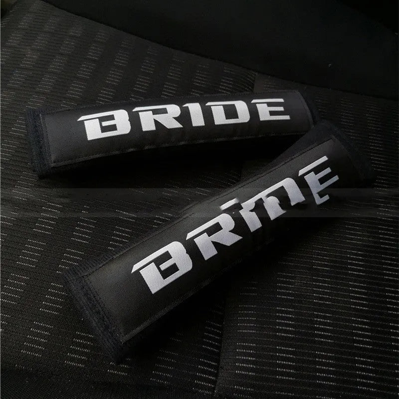 Car seat belt shoulder pads in three colours with cotton and sponge cloth construction