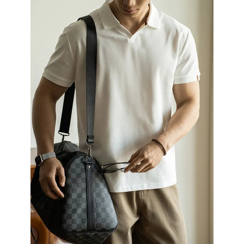 Blue American-style short-sleeved cotton blend polo shirt laid flat, showing regular fit and button placket.