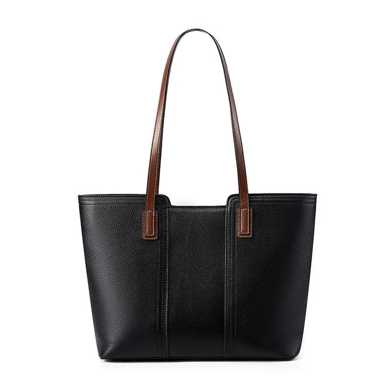 Women's black genuine leather crossbody bag with internal organiser compartments showing document and phone sections