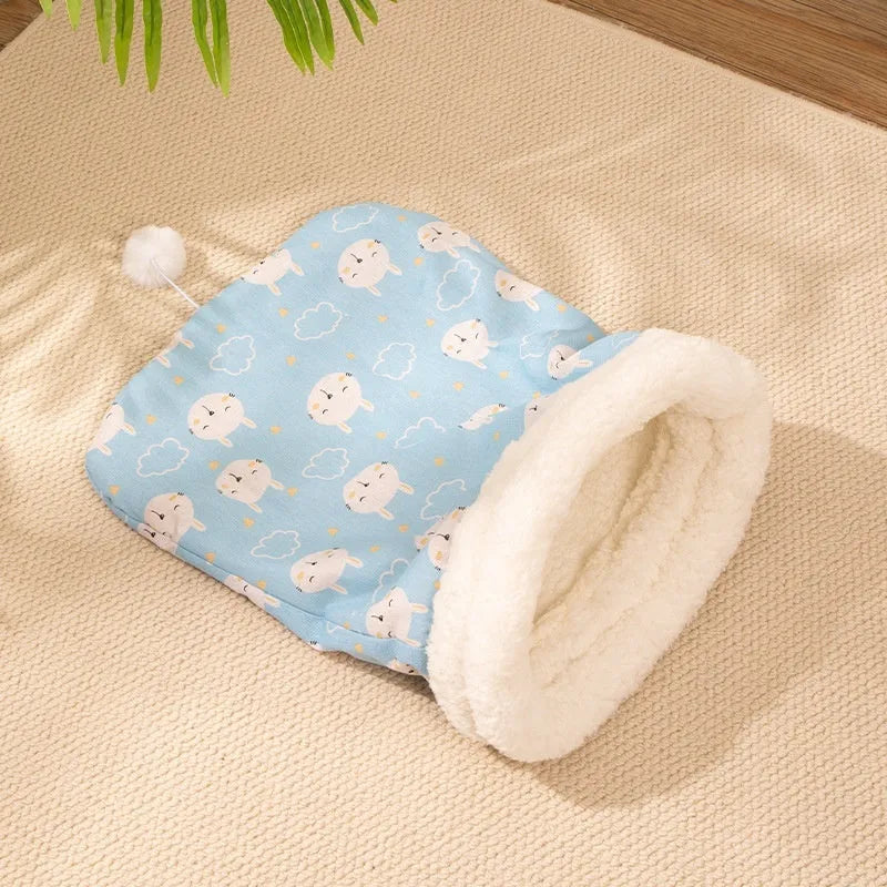 Cat sleeping bag nest pet bed measuring 50cm by 40cm in blue rabbit design